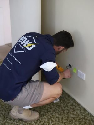 EWJ Electrical electrician installing a new power point in a Brisbane home